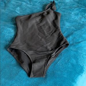 Woman’s small one piece one shoulder bathing suit